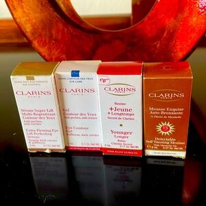 CLARINS Exclusive set 4 mini NEW unopened samples of their most coveted products